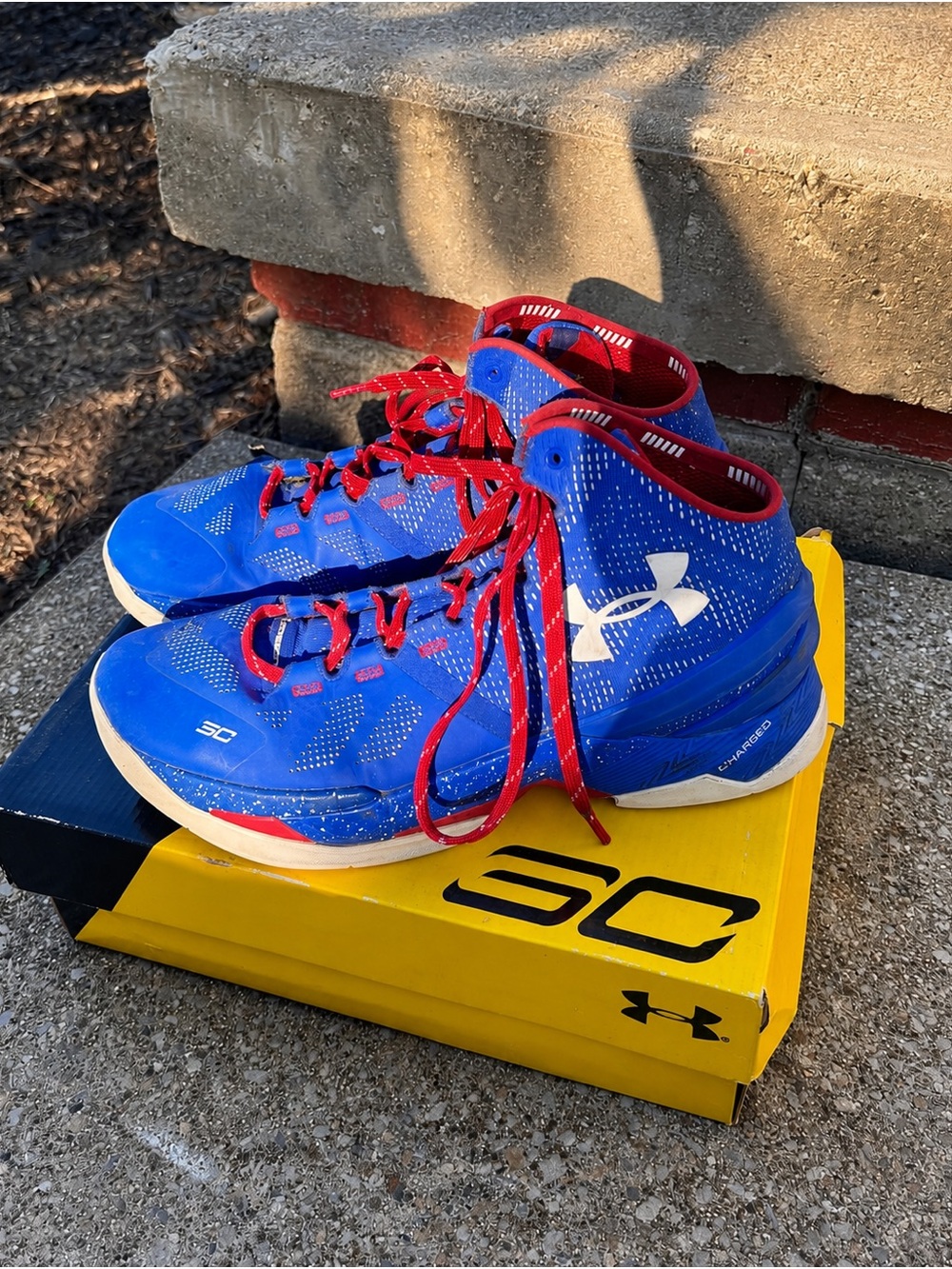 Under Armour Men’s Steph Curry Blue and Red High-Top Basketball Sneakers